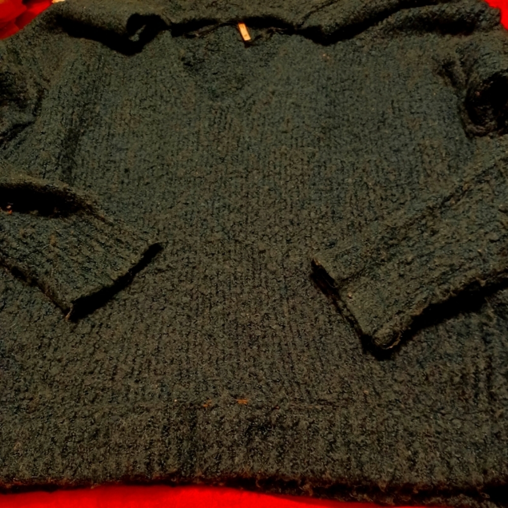Free People dark green V neck Sweater. Size Small.